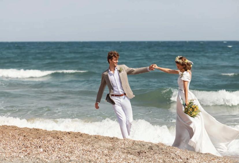 husband and wife at the beach